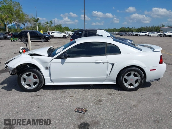 2004 Ford Mustang Standard with VIN 1FAFP40404F103699, listed as a IAAI auction lot 41804765 with 193,986 mi miles. Bid and sale history available at carsss.com. Image 14.