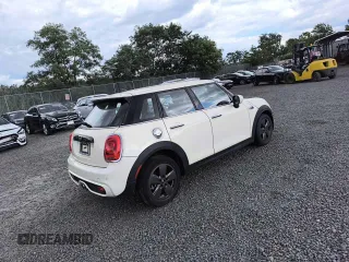 2021 MINI Hardtop 4 Door Cooper S with VIN WMWXU9C09M2P43346, listed as a Copart auction lot 68969854 with 22,394 mi miles and Salvage title. Bid and sale history available at DreamBid. Image 4.