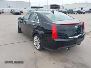 2015 Cadillac ATS Sedan Luxury RWD with VIN 1G6AB5RX3F0102898, listed as a IAAI auction lot 41943935 with 160,985 mi miles. Bid and sale history available at carsss.com. Image 3.