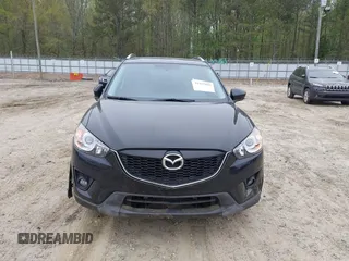 2014 Mazda CX-5 Touring with VIN JM3KE2CY7E0341658, listed as a IAAI auction lot 41915807 with 99,287 mi miles. Bid and sale history available at carsss.com. Image 13.
