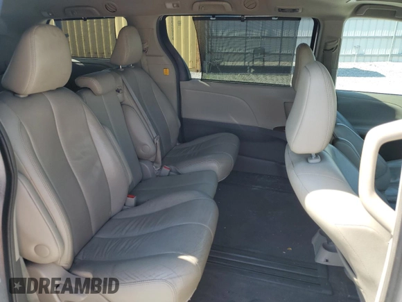 2013 Toyota Sienna XLE AAS с VIN 5TDYK3DC8DS391355, выставлен на аукционе Copart как лот 59232155 с пробегом 230 999 миль миль и Списание • Salvage title. История ставок и продаж доступна на DreamBid. Изображение 11.