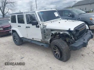2013 Jeep Wrangler Unlimited Sport z VIN 1C4BJWDGXDL602036, wystawiony jako IAAI lot #42039681 z przebiegiem 154 903 mil mil oraz . Historia ofert i sprzedaży dostępna na DreamBid. Obrazek 1.