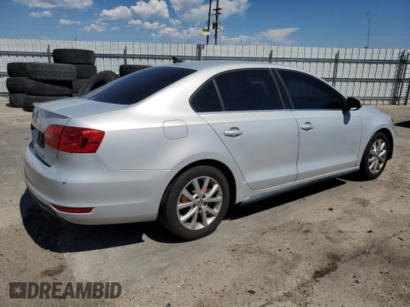 2012 Volkswagen Jetta PZEV with VIN 3VW4A7AJXCM123009, listed as a Copart auction lot 63573145 with 242,860 mi miles and Clean title. Bid and sale history available at DreamBid. Image 3.