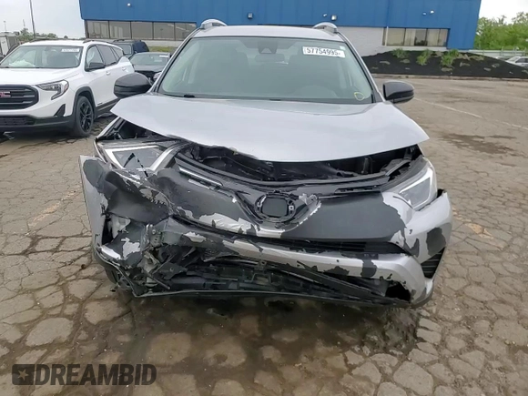 2017 Toyota RAV4 LE с VIN 2T3BFREVXHW672218, выставлен на аукционе Copart как лот 57754995 с пробегом 102 870 миль миль и Чистый • Clean title. История ставок и продаж доступна на DreamBid. Изображение 14.