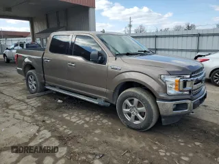 2018 Ford F-150 XL with VIN 1FTEW1EG1JKD01897, listed as a Copart auction lot 52923115 with 219,341 mi miles and Clean Title. Bid and sale history available at carsss.com. Image 4.