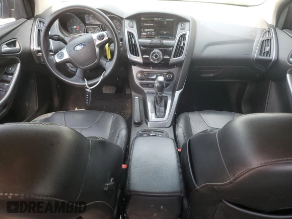 2014 Ford Focus Titanium with VIN 1FADP3J20EL347435, listed as a Copart auction lot 54947345 with 144,169 mi miles and Salvage title. Bid and sale history available at DreamBid. Image 8.