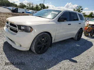 2012 Dodge Durango R/T z VIN 1C4SDJCT1CC331052, wystawiony jako Copart lot #56899465 z przebiegiem 112 003 mil mil oraz Szkoda całkowita • Salvage title. Historia ofert i sprzedaży dostępna na DreamBid. Obrazek 1.