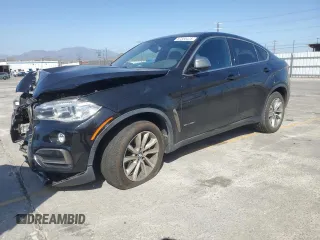2018 BMW X6 sDrive35i z VIN 5UXKU0C54J0G69704, wystawiony jako Copart lot #57335475 z przebiegiem 61 777 mil mil oraz Szkoda całkowita • Salvage title. Historia ofert i sprzedaży dostępna na DreamBid. Obrazek 1.