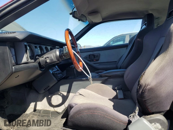 1990 Pontiac Firebird с VIN 1G2FS23T2LL206191, выставлен на аукционе Copart как лот 76175064 с пробегом 103 903 миль миль и Списание • Salvage title. История ставок и продаж доступна на DreamBid. Изображение 7.