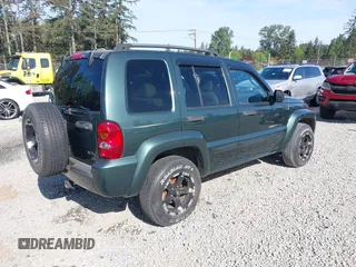 2002 Jeep Liberty Limited z VIN 1J8GL58KX2W327605, wystawiony jako IAAI lot #42217110 z przebiegiem 178 200 mil mil oraz . Historia ofert i sprzedaży dostępna na DreamBid. Obrazek 4.