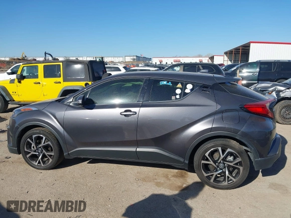 2019 Toyota C-HR XLE with VIN JTNKHMBX1K1062180, listed as a IAAI auction lot 41769979 with 75,159 mi miles. Bid and sale history available at carsss.com. Image 14.