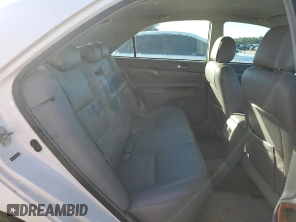 2006 Toyota Camry STD z VIN 4T1BE32K56U739243, wystawiony jako Copart lot #79918463 z przebiegiem 123 321 mil mil oraz Szkoda całkowita • Salvage title. Historia ofert i sprzedaży dostępna na DreamBid. Obrazek 10.