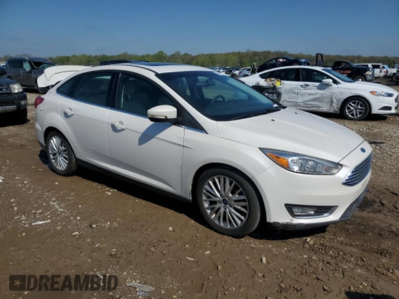 2018 Ford Focus Titanium with VIN 1FADP3J21JL294061, listed as a Copart auction lot 53827375 with 194,577 mi miles and Salvage title. Bid and sale history available at DreamBid. Image 4.
