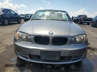 2011 BMW 1 Series 128i with VIN WBAUN1C52BVH82744, listed as a Copart auction lot 63441125 with 129,245 mi miles and Salvage title. Bid and sale history available at DreamBid. Image 5.