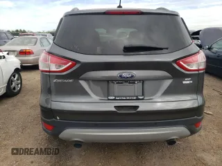 2016 Ford Escape SE with VIN 1FMCU9GX3GUB32712, listed as a Copart auction lot 56870755 with 148,011 mi miles and Clean Title. Bid and sale history available at DreamBid. Image 6.