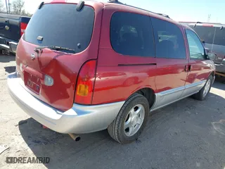 1999 Nissan Quest GXE with VIN 4N2XN11T8XD818140, listed as a IAAI auction lot 41838628 with 205,841 mi miles. Bid and sale history available at carsss.com. Image 4.