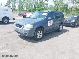2005 Ford Escape XLT with VIN 1FMYU03185KB65040, listed as a IAAI auction lot 42133816 with 132,525 mi miles. Bid and sale history available at carsss.com. Image 2.