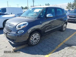 2014 FIAT 500L Lounge with VIN ZFBCFACH1EZ029757, listed as a IAAI auction lot 41643494 with 49,910 mi miles and . Bid and sale history available at DreamBid. Image 2.