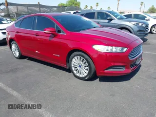 2014 Ford Fusion SE Hybrid z VIN 3FA6P0LU6ER164192, wystawiony jako IAAI lot #42715956 z przebiegiem 260 855 mil mil oraz . Historia ofert i sprzedaży dostępna na DreamBid. Obrazek 1.