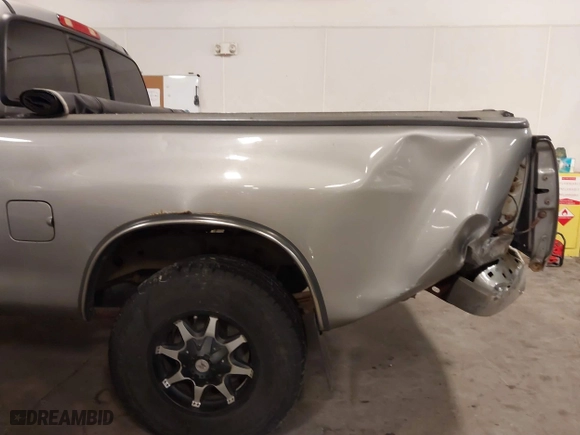 2005 Toyota Tundra SR5 with VIN 5TBBT44155S459077, listed as a IAAI auction lot 41622265 with 210,746 mi miles. Bid and sale history available at carsss.com. Image 20.
