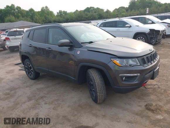 2019 Jeep Compass Trailhawk z VIN 3C4NJDDB9KT686048, wystawiony jako IAAI lot #42414161 z przebiegiem 92 683 mil mil oraz . Historia ofert i sprzedaży dostępna na DreamBid. Obrazek 1.