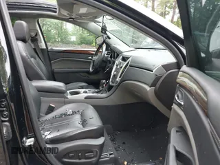 2011 Cadillac SRX Premium Collection with VIN 3GYFNCEY3BS673043, listed as a IAAI auction lot 42499237 with 174,132 mi miles and . Bid and sale history available at DreamBid. Image 5.