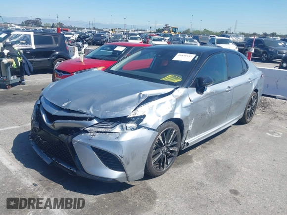 2020 Toyota Camry XSE with VIN 4T1K61AK1LU318098, listed as a IAAI auction lot 41838182 with 64,118 mi miles and . Bid and sale history available at DreamBid. Image 18.