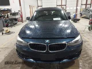 2014 BMW 3 Series 328i Gran Turismo xDrive with VIN WBA3X5C5XED557668, listed as a IAAI auction lot 41728522 with 123,393 mi miles and . Bid and sale history available at DreamBid. Image 12.