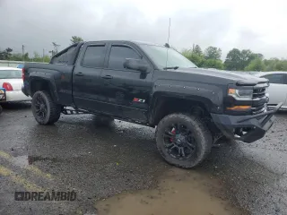 2016 Chevrolet Silverado 1500 LT with VIN 1GCVKRECXGZ383216, listed as a Copart auction lot 56497415 with 105,894 mi miles and Salvage Title. Bid and sale history available at DreamBid. Image 4.