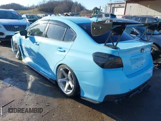 2016 Subaru WRX with VIN JF1VA1B61G9826975, listed as a IAAI auction lot 41511402 with 86,000 mi miles. Bid and sale history available at carsss.com. Image 3.