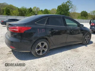 2018 Ford Focus SE z VIN 1FADP3FE5JL236330, wystawiony jako Copart lot #53145065 z przebiegiem 104 228 mil mil oraz Szkoda całkowita • Salvage title. Historia ofert i sprzedaży dostępna na DreamBid. Obrazek 3.