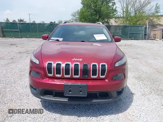 2014 Jeep Cherokee Altitude with VIN 1C4PJMCB7EW185958, listed as a IAAI auction lot 42002583 with 118,256 mi miles and . Bid and sale history available at DreamBid. Image 12.