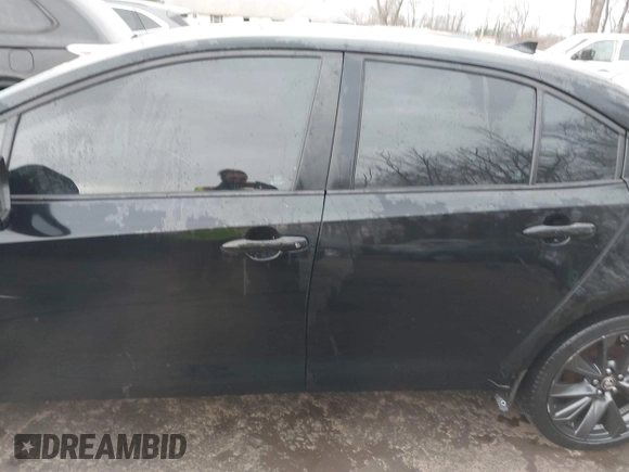 2023 Toyota Corolla SE with VIN 5YFS4MCE6PP160556, listed as a IAAI auction lot 41576922 with 55,318 mi miles and . Bid and sale history available at DreamBid. Image 14.