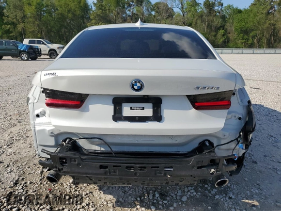 2022 BMW 3 Series 330e with VIN 3MW5P7J03N8C66082, listed as a Copart auction lot 50627595 with 70,799 mi miles and Salvage Title. Bid and sale history available at carsss.com. Image 6.