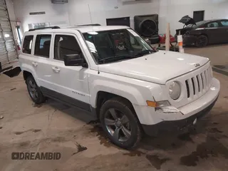 2014 Jeep Patriot Latitude with VIN 1C4NJPFA3ED739925, listed as a IAAI auction lot 41623546 with 130,374 mi miles and . Bid and sale history available at carsss.com. Image 1.