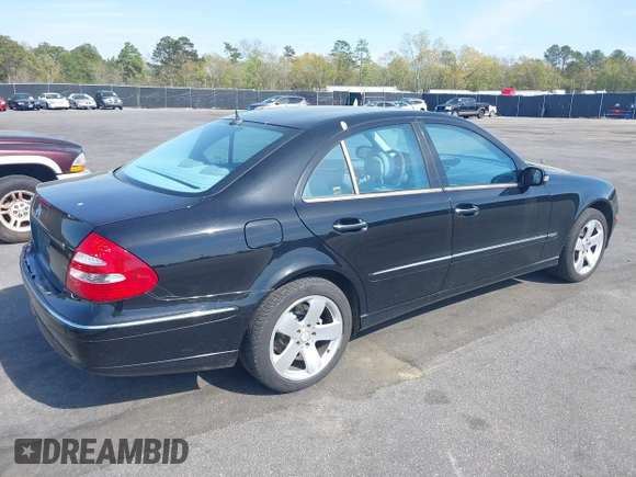 2003 Mercedes-Benz E-Class 3.2L with VIN WDBUF65J33A112308, listed as a IAAI auction lot 41871334 with 138,522 mi miles. Bid and sale history available at carsss.com. Image 4.