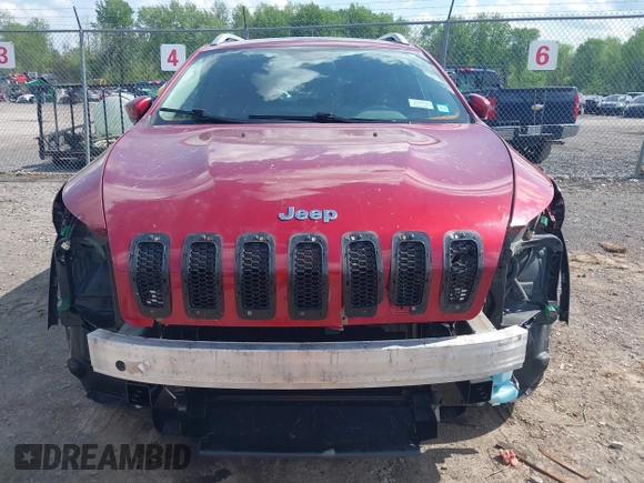 2016 Jeep Cherokee Latitude z VIN 1C4PJMCB9GW305472, wystawiony jako IAAI lot #42276395 z przebiegiem 112 621 mil mil oraz . Historia ofert i sprzedaży dostępna na DreamBid. Obrazek 6.
