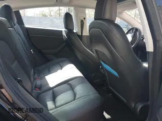 2023 Tesla Model 3 Long Range with VIN 5YJ3E1EB1PF392027, listed as a IAAI auction lot 41983638 with 31,415 mi miles and . Bid and sale history available at DreamBid. Image 8.