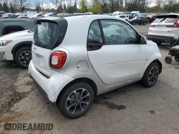 2017 Smart fortwo Pure with VIN WMEFJ5DA0HK176622, listed as a Copart auction lot 51644835 with 59,924 mi miles and Salvage Title. Bid and sale history available at DreamBid. Image 3.