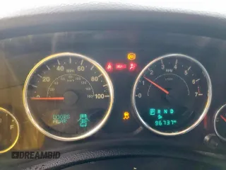 2015 Jeep Wrangler Unlimited Rubicon Hard Rock with VIN 1C4HJWFG1FL710264, listed as a Copart auction lot 54123285 with 96,737 mi miles and Salvage title. Bid and sale history available at DreamBid. Image 9.