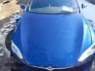 2020 Tesla Model S Long Range with VIN 5YJSA1E26LF410779, listed as a IAAI auction lot 41241192 with 68,764 mi miles and . Bid and sale history available at DreamBid. Image 10.