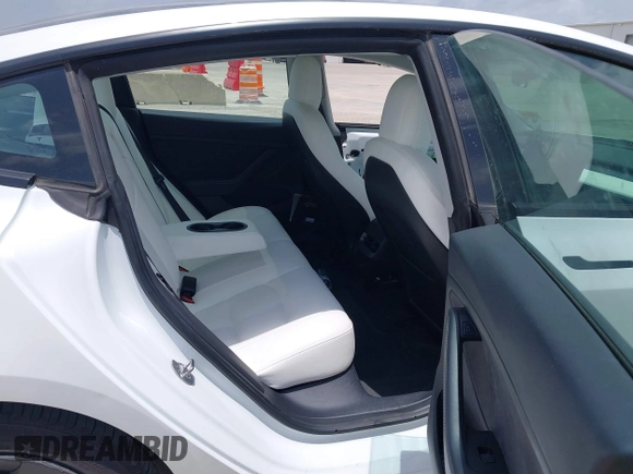 2023 Tesla Model 3 z VIN 5YJ3E1EA8PF384806, wystawiony jako IAAI lot #42526063 z przebiegiem 95 389 mil mil oraz . Historia ofert i sprzedaży dostępna na DreamBid. Obrazek 8.