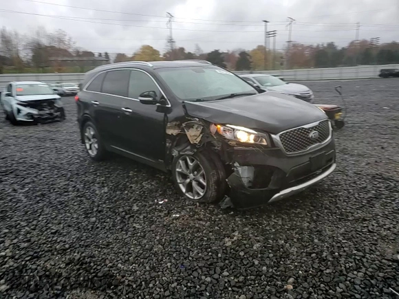 2016 Kia Sorento SXL z VIN 5XYPKDA19GG012725, wystawiony jako Copart lot #80313254 z przebiegiem 86 852 mil mil oraz Szkoda całkowita • Salvage title. Historia ofert i sprzedaży dostępna na DreamBid. Obrazek 12.