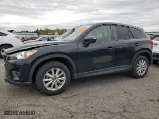 2015 Mazda CX-5 Touring with VIN JM3KE4CY3F0475757, listed as a Copart auction lot 53477875 with 104,546 mi miles and Salvage Title. Bid and sale history available at carsss.com. Image 1.