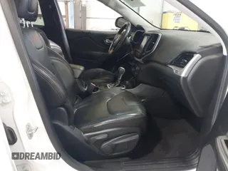 2016 Jeep Cherokee Trailhawk z VIN 1C4PJMBS6GW242123, wystawiony jako IAAI lot #41156712 z przebiegiem 136 596 mil mil oraz . Historia ofert i sprzedaży dostępna na DreamBid. Obrazek 5.