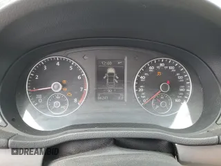 2014 Volkswagen Passat SE z VIN 1VWBT7A38EC049323, wystawiony jako Copart lot #57847025 z przebiegiem 86 241 mil mil oraz Tytuł czysty. Historia ofert i sprzedaży dostępna na DreamBid. Obrazek 9.