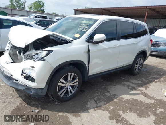 2017 Honda Pilot EX-L with VIN 5FNYF6H5XHB005000, listed as a IAAI auction lot 42039832 with 141,592 mi miles and . Bid and sale history available at DreamBid. Image 2.