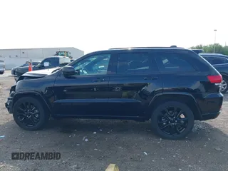 2021 Jeep Grand Cherokee Laredo E with VIN 1C4RJEAG0MC571375, listed as a IAAI auction lot 42087648 with 29,358 mi miles and . Bid and sale history available at DreamBid. Image 15.