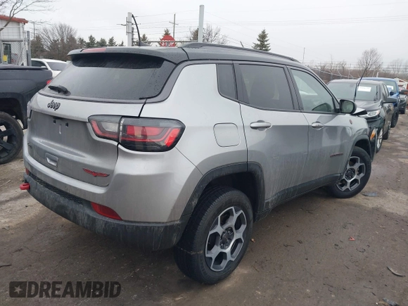 2022 Jeep Compass Trailhawk with VIN 3C4NJDDB3NT128118, listed as a IAAI auction lot 41664845 with 32,660 mi miles and . Bid and sale history available at DreamBid. Image 4.