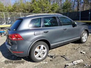 2012 Volkswagen Touareg Lux с VIN WVGEK9BP1CD008132, выставлен на аукционе Copart как лот 49501765 с пробегом 156 594 миль миль и Списание • Salvage title. История ставок и продаж доступна на DreamBid. Изображение 3.